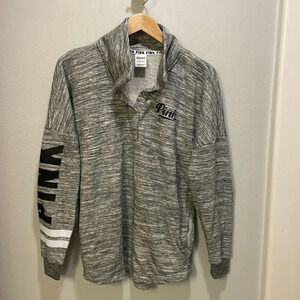 Pink woman’s grey and white pullover sweatshirt with two front side pockets